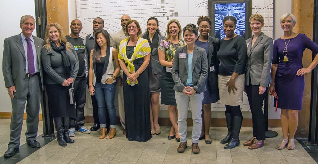 Portland Mayor Charles Hales (far left) and First Lady Nancy Hales (far right) with the 2015 Startup PDX Challenge graduates. 